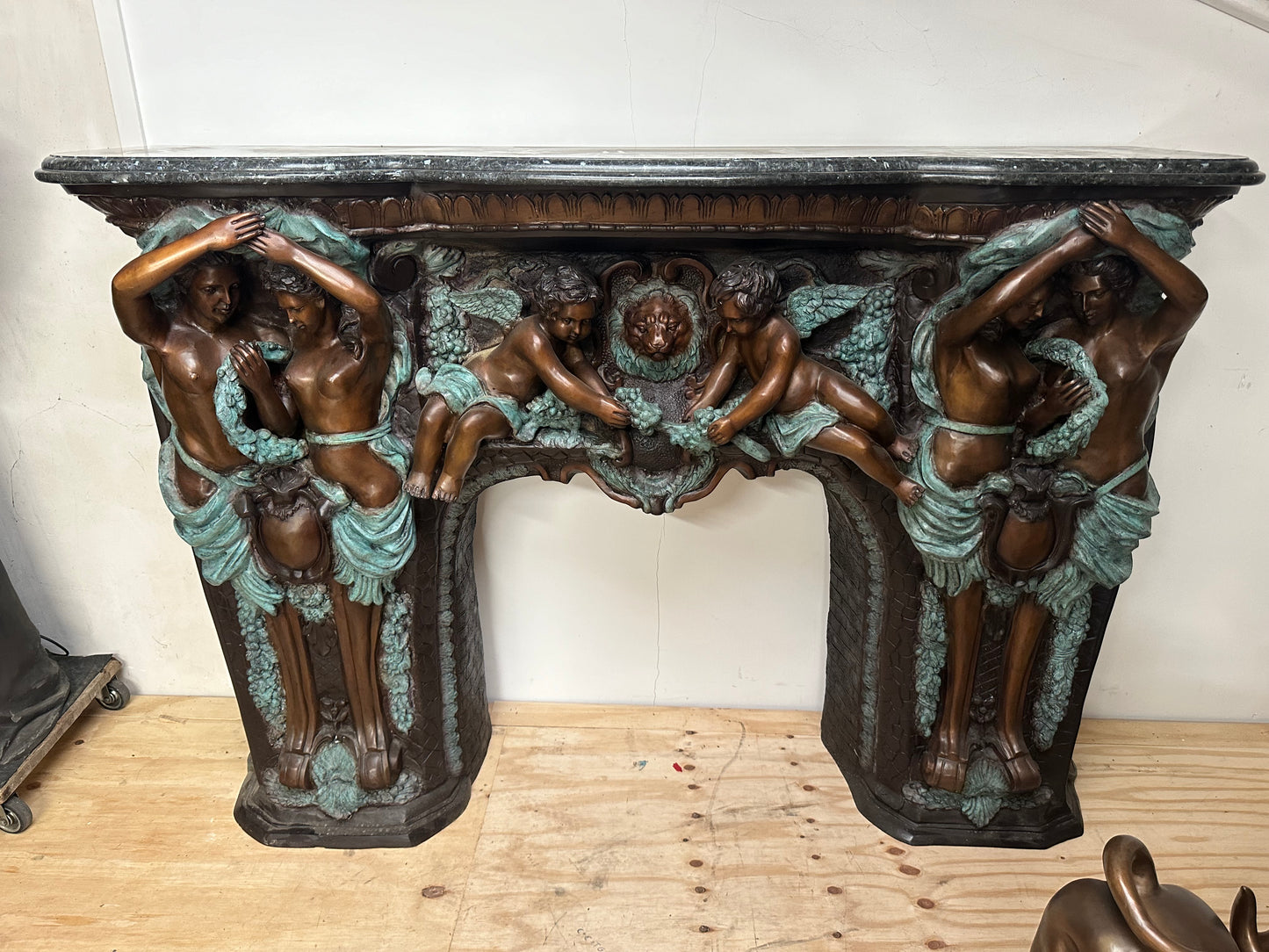Exquisite, Italian solid bronze fireplace with marble top