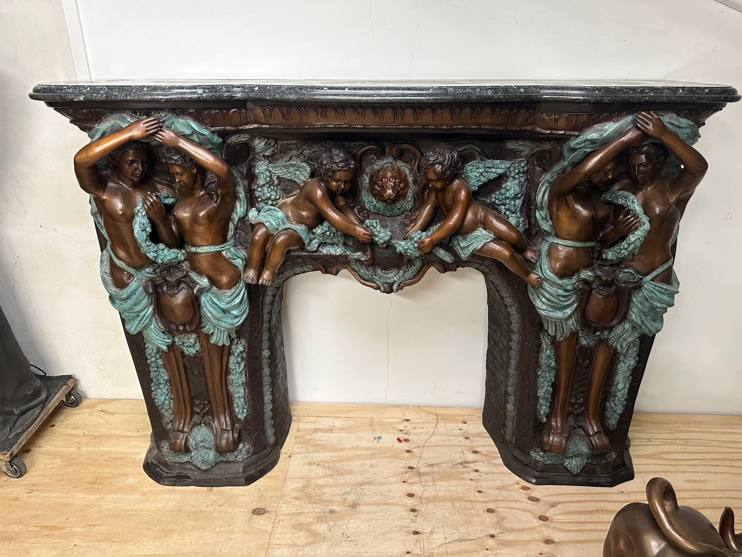 Exquisite, Italian solid bronze fireplace with marble top