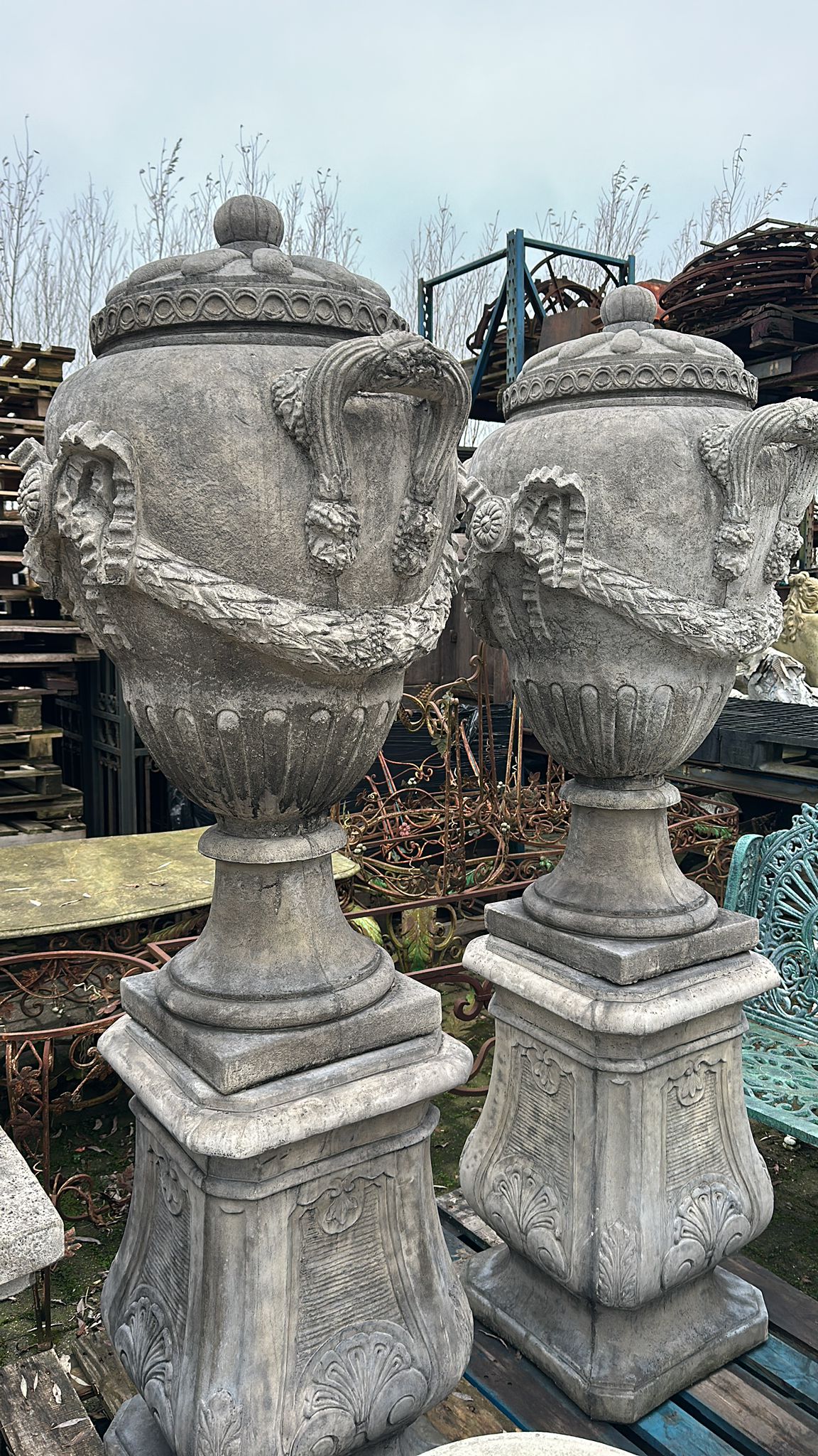 Huge pair, 7.5ft tall, decorative urns on plinths