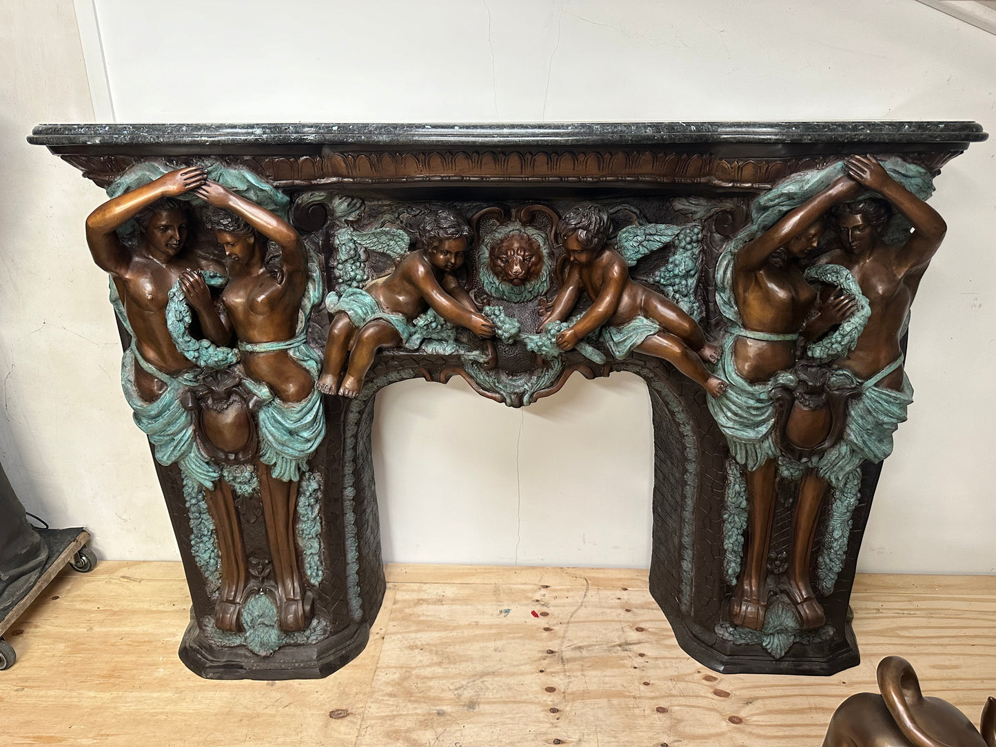 Exquisite, Italian solid bronze fireplace with marble top