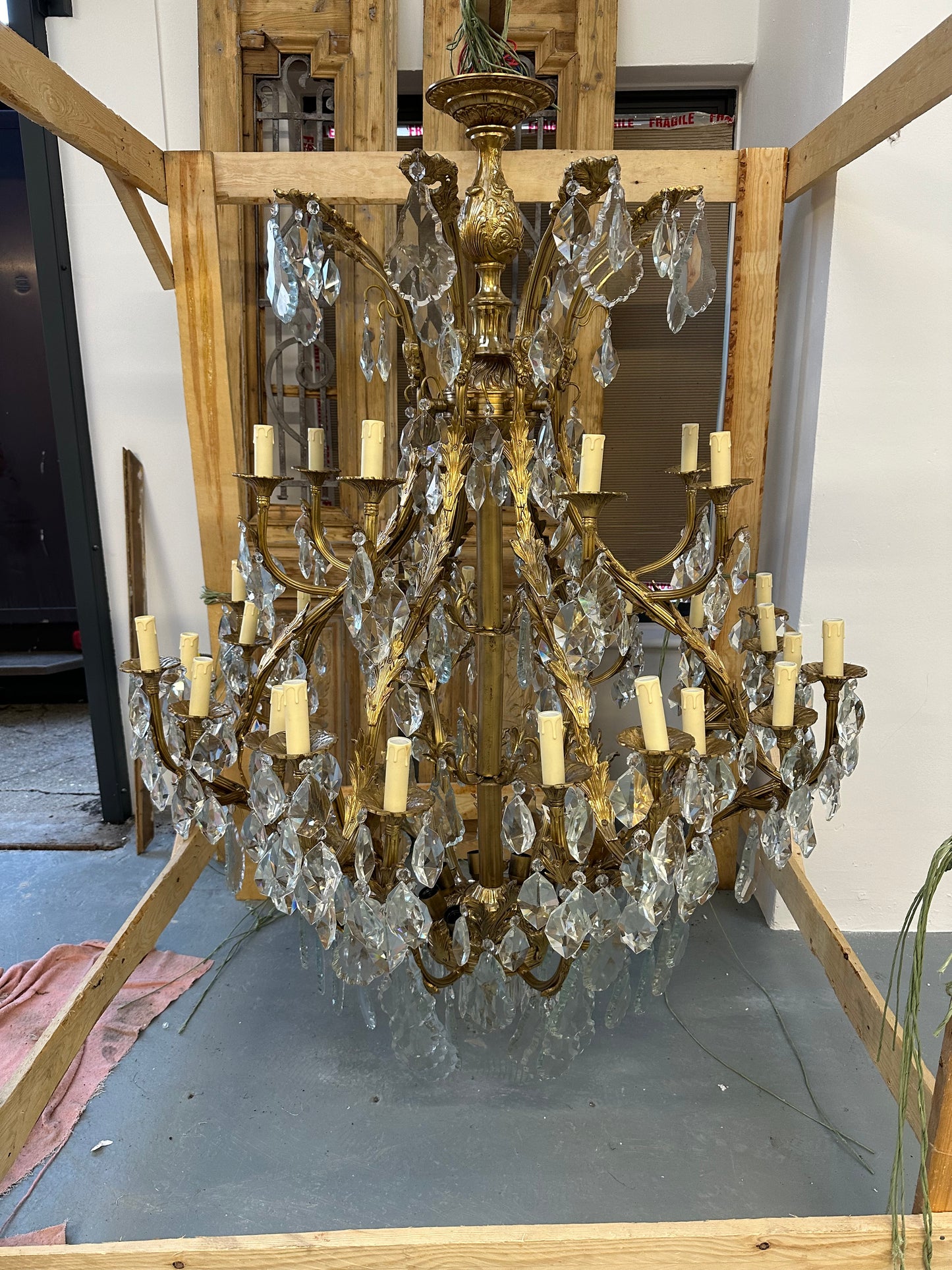 A stunning, matching pair of huge baroque French antique chandeliers from Bordeaux