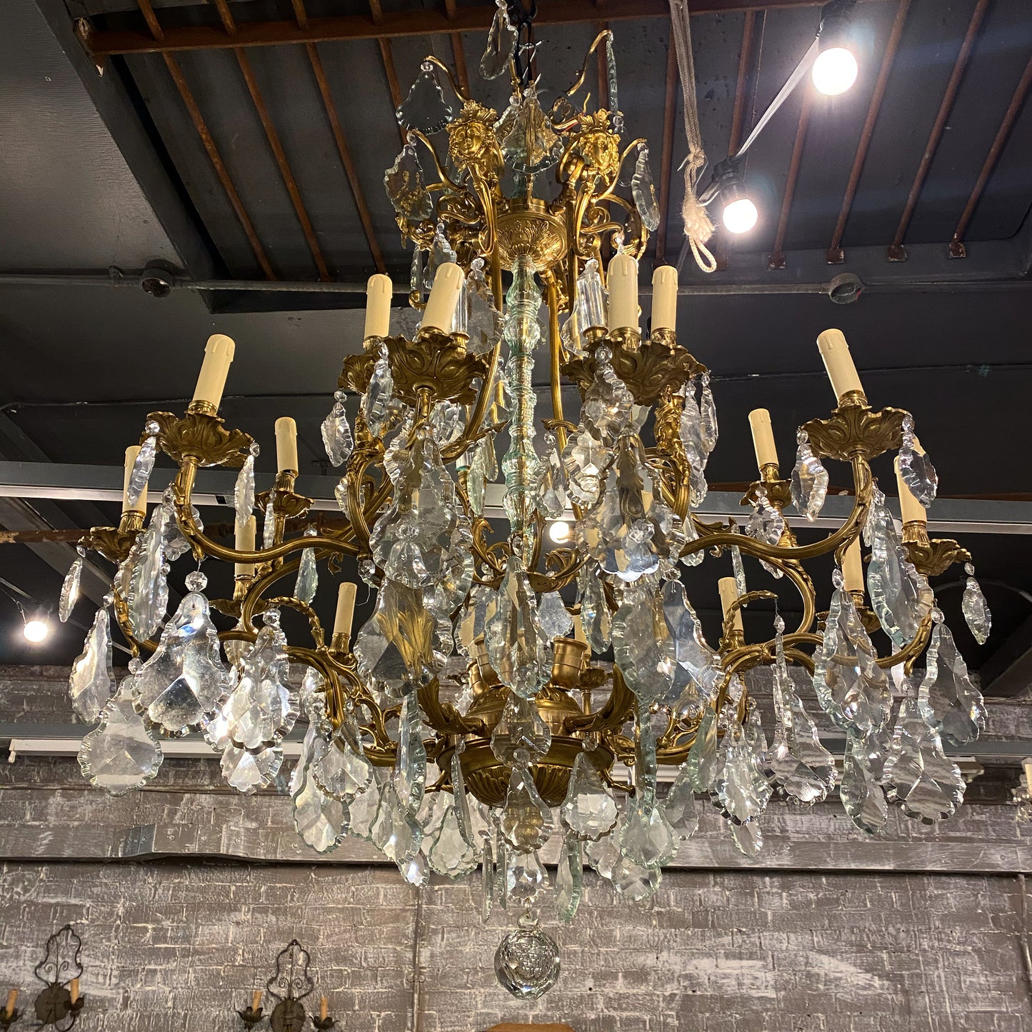 Fantastic pair of French bronze/crystal chandelier with lady head details