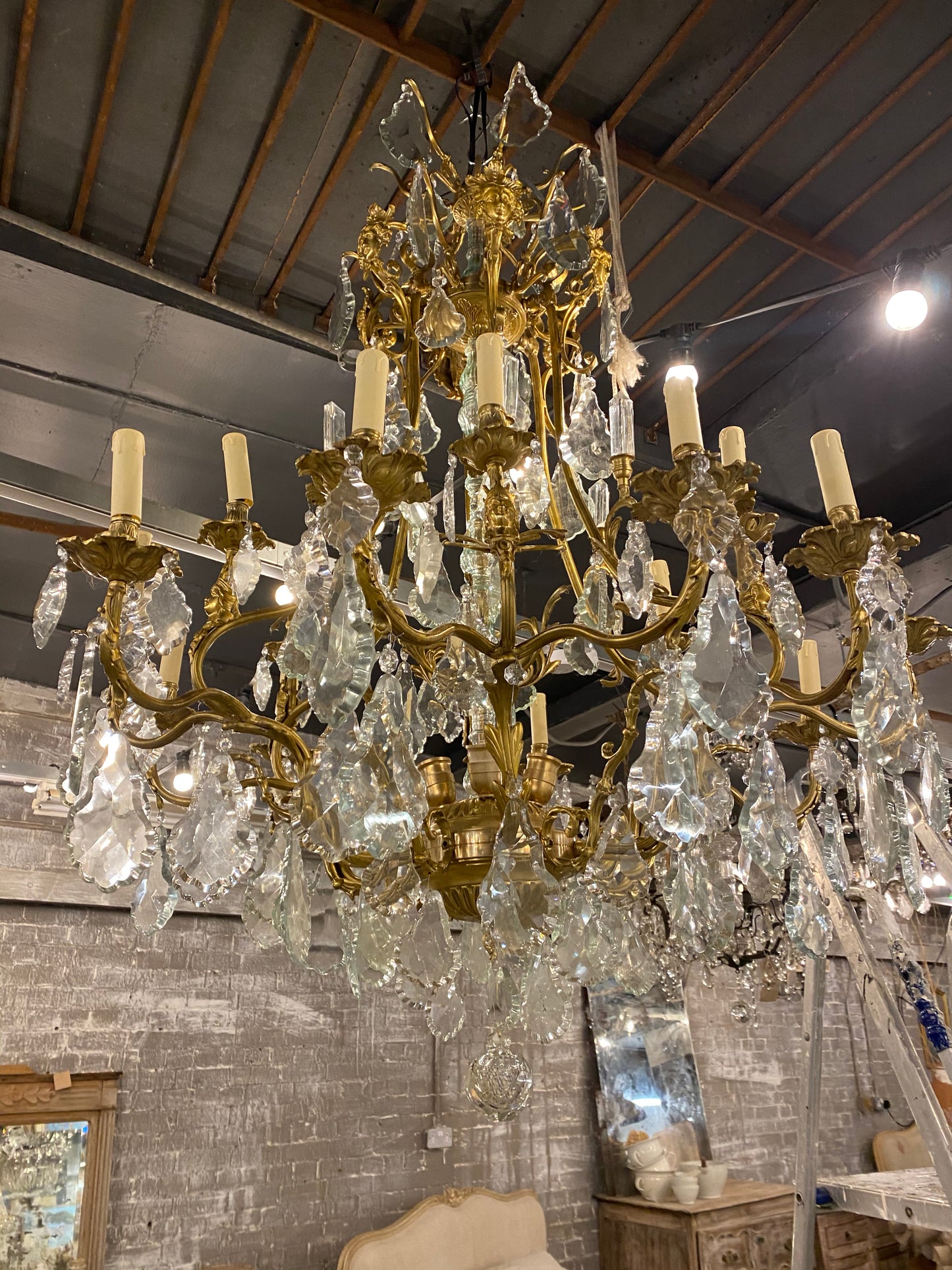 Fantastic pair of French bronze/crystal chandelier with lady head details