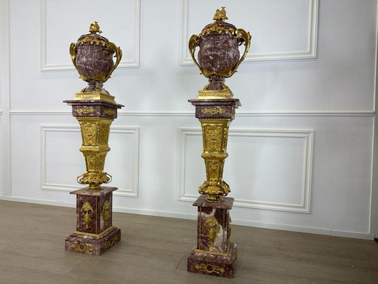 Royal, marble urns on marble stands with bronze ormolu decoration (pair available)