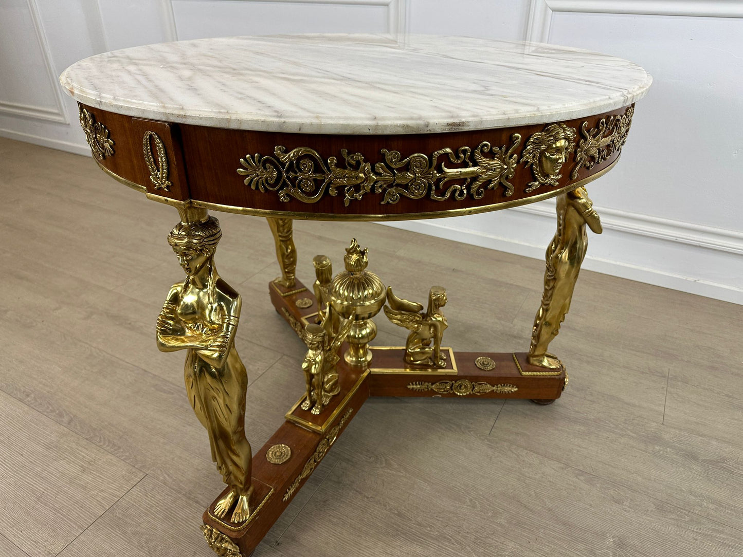 Stunning, bronze marble top french centre table with ormolu decoration