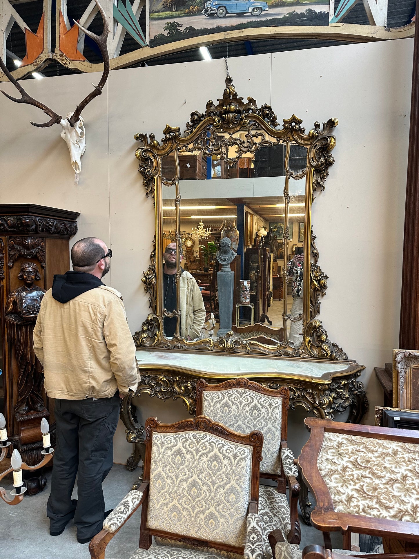 Huge, antique gilt wood, French console table and mirror, marble top