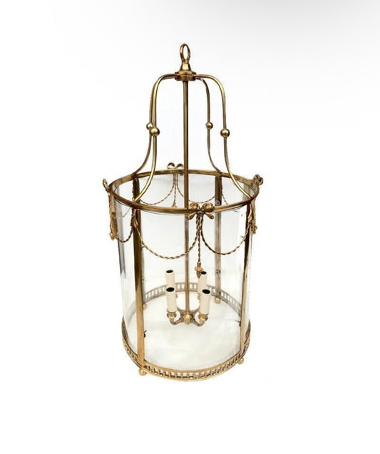 Pair of, French curved antique brass lanterns with bows (priced individually)