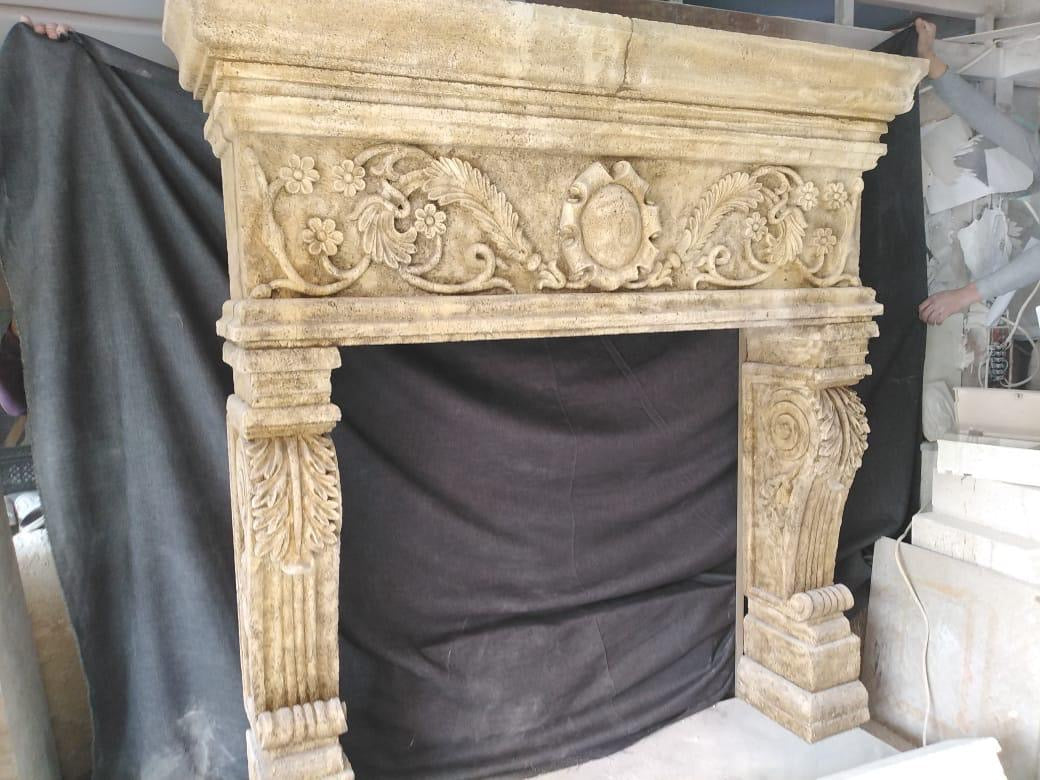 Beautiful antique sand stone Italian fireplace, hand carved