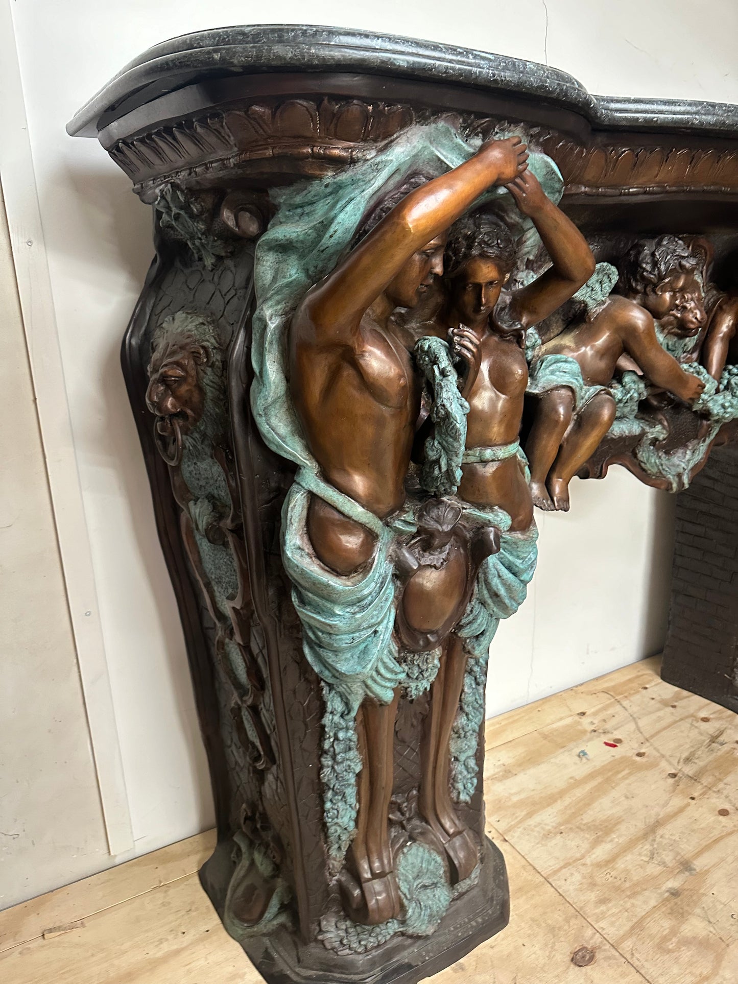 Exquisite, Italian solid bronze fireplace with marble top