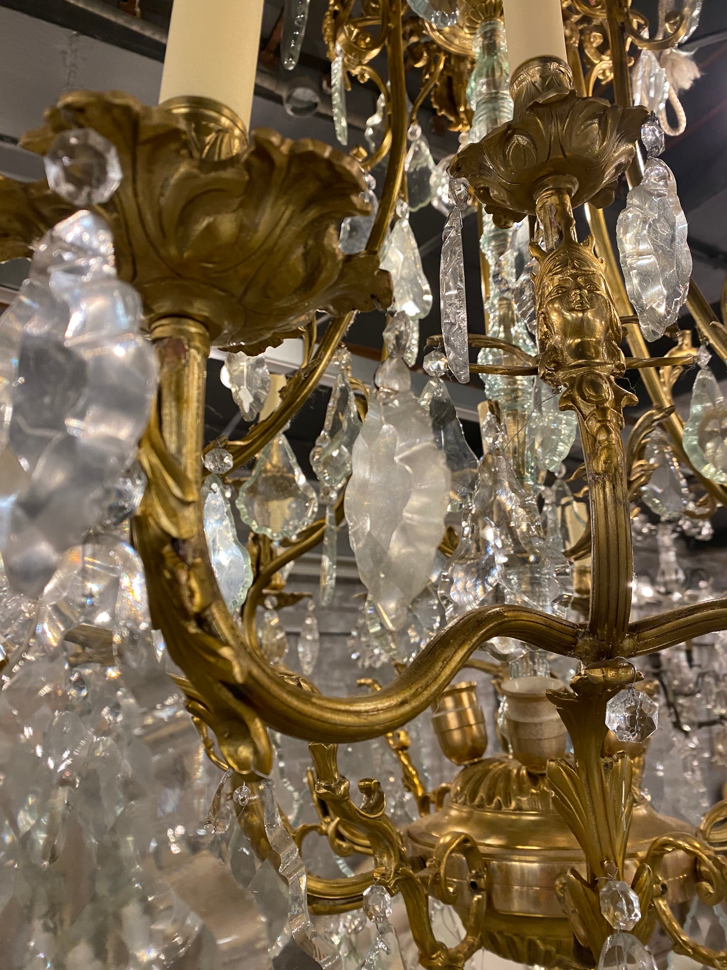 Fantastic pair of French bronze/crystal chandelier with lady head details