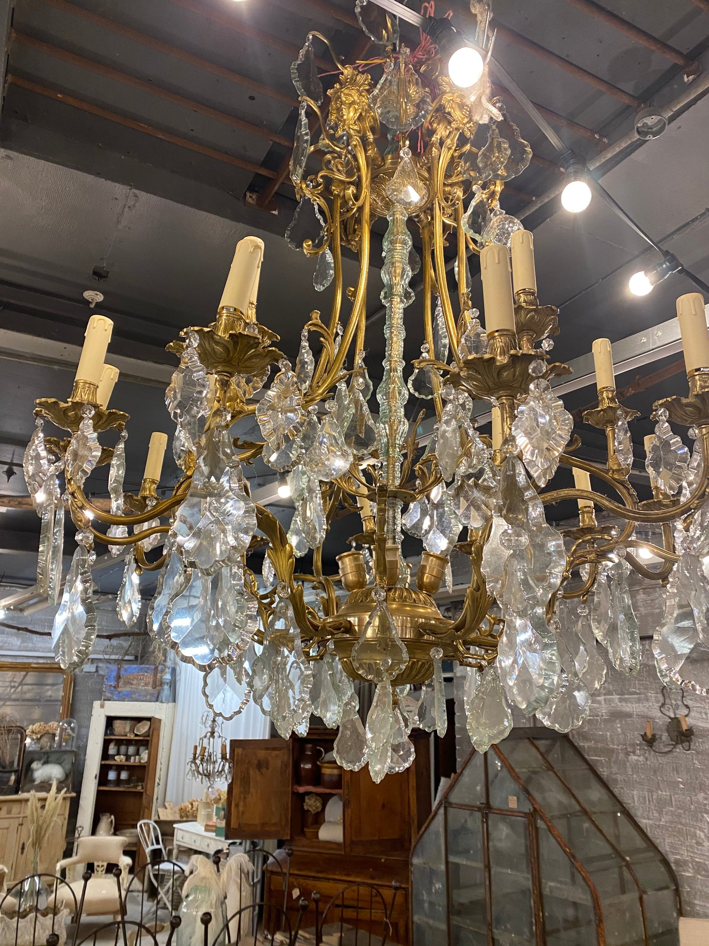 Fantastic pair of French bronze/crystal chandelier with lady head details