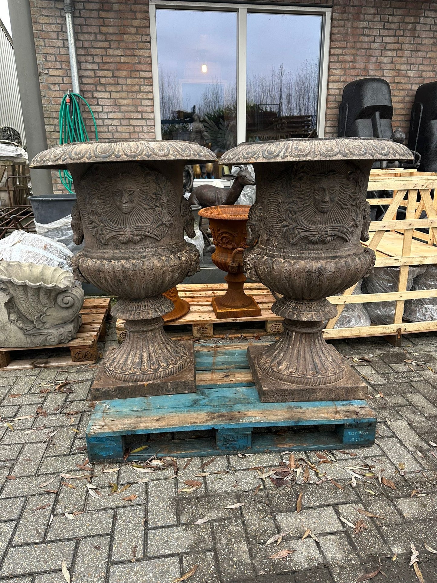 Pair of 4ft tall cast iron french urns