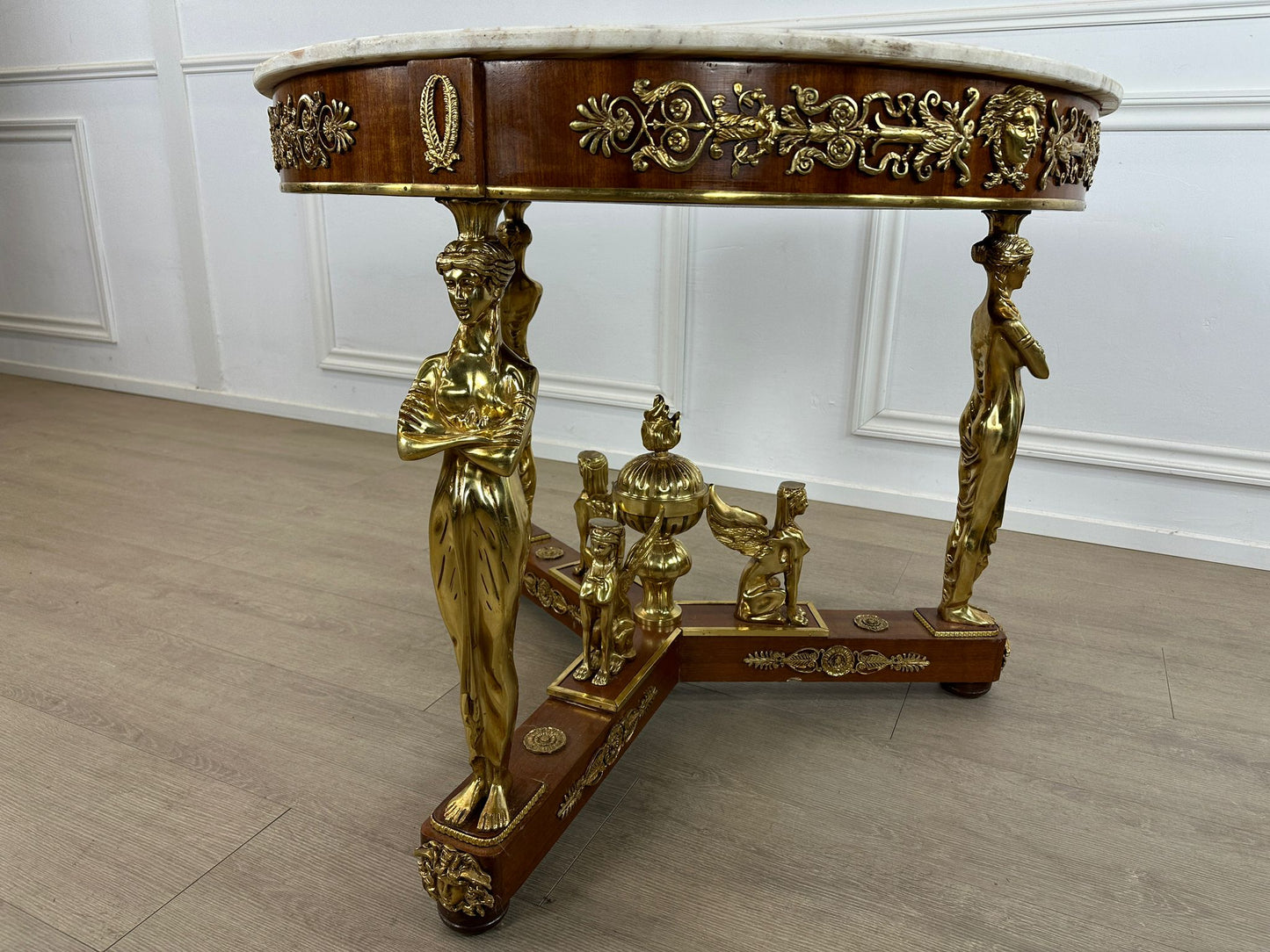 Stunning, bronze marble top french centre table with ormolu decoration