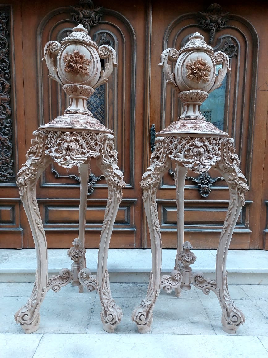 5.5ft tall, french gilt wood urns on stands