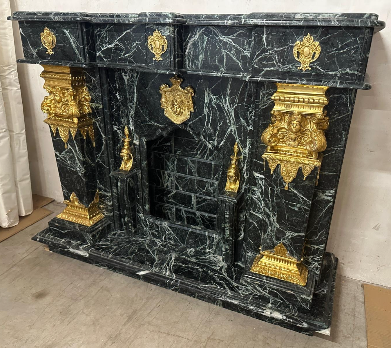 Stunning, French Napoleon black marble fireplace with bronze work