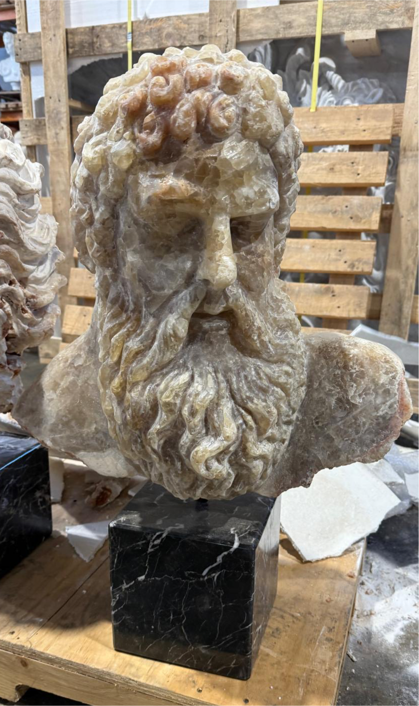 Impressive, 1 piece, hand carved solid calcite crystal Greek God, on marble plinth