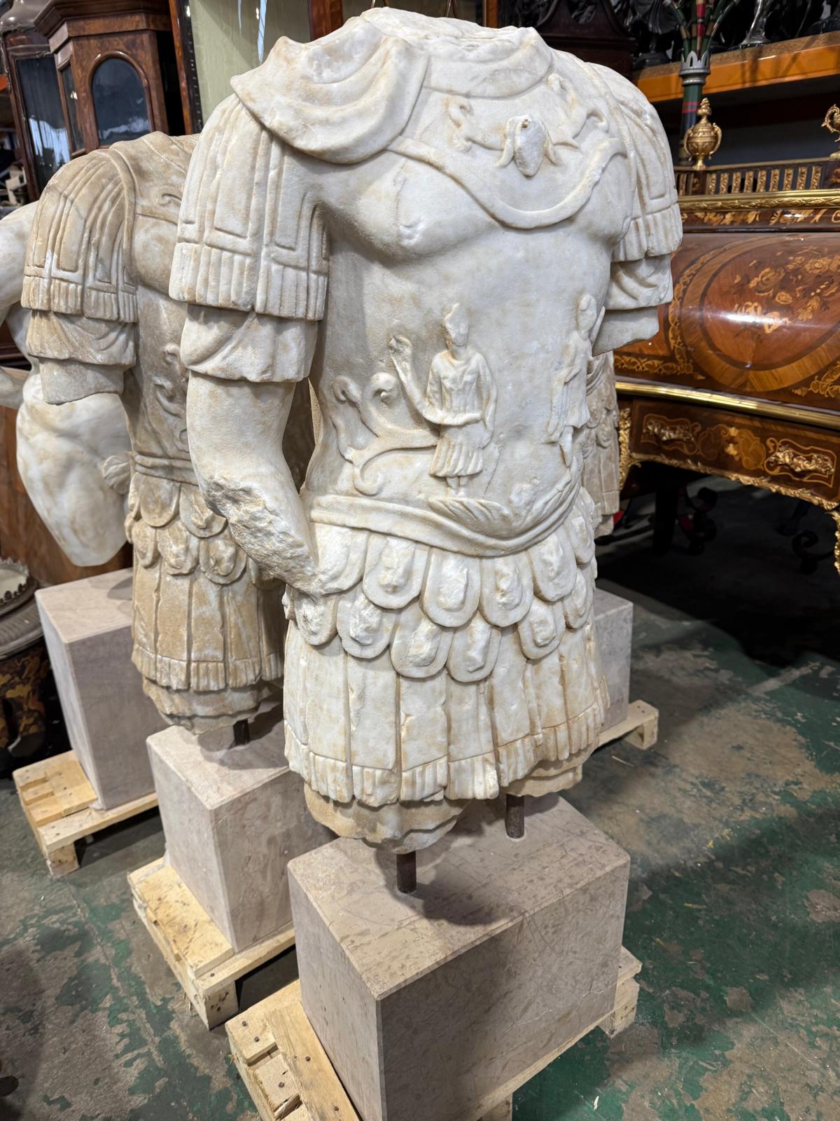 Pair of, Roman marble centurion busts on stands (priced individually)