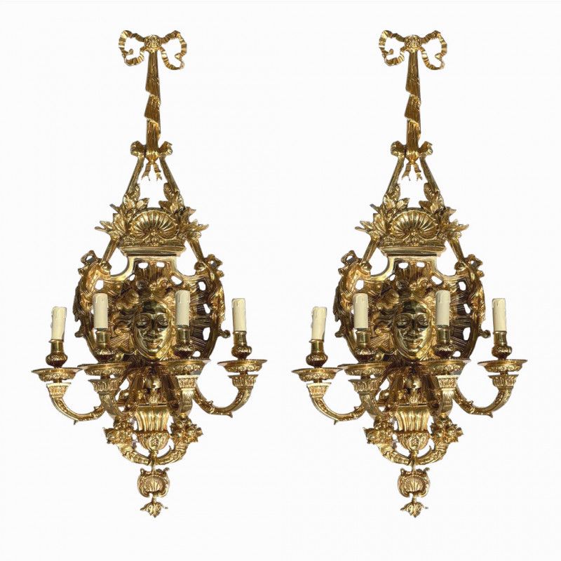 Lovely pair of lady face bronze wall lights (priced individually)