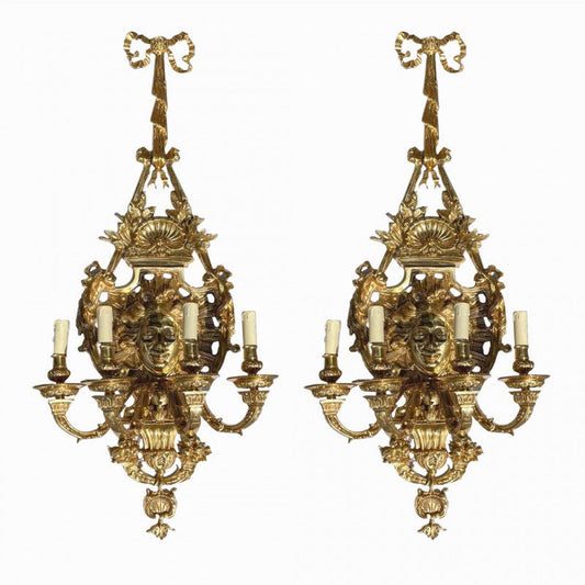 Lovely pair of lady face bronze wall lights (priced individually)